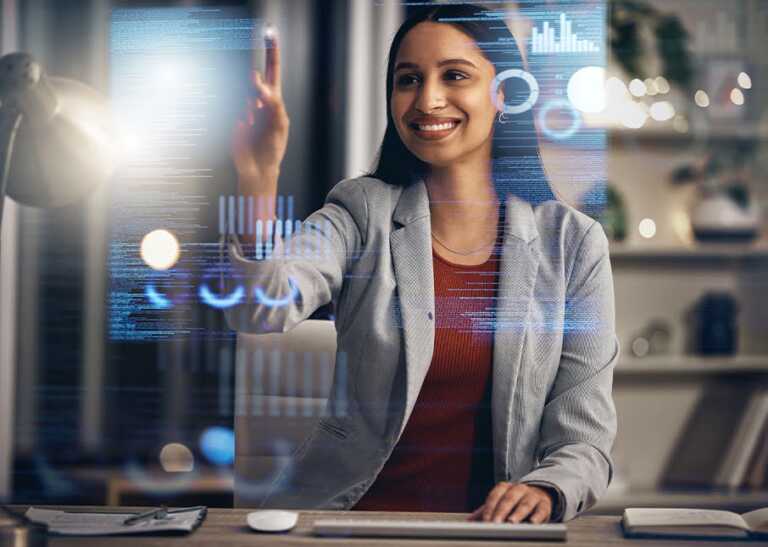 Smiling Woman Engages with Talent Acquisition Data on Virtual Screen