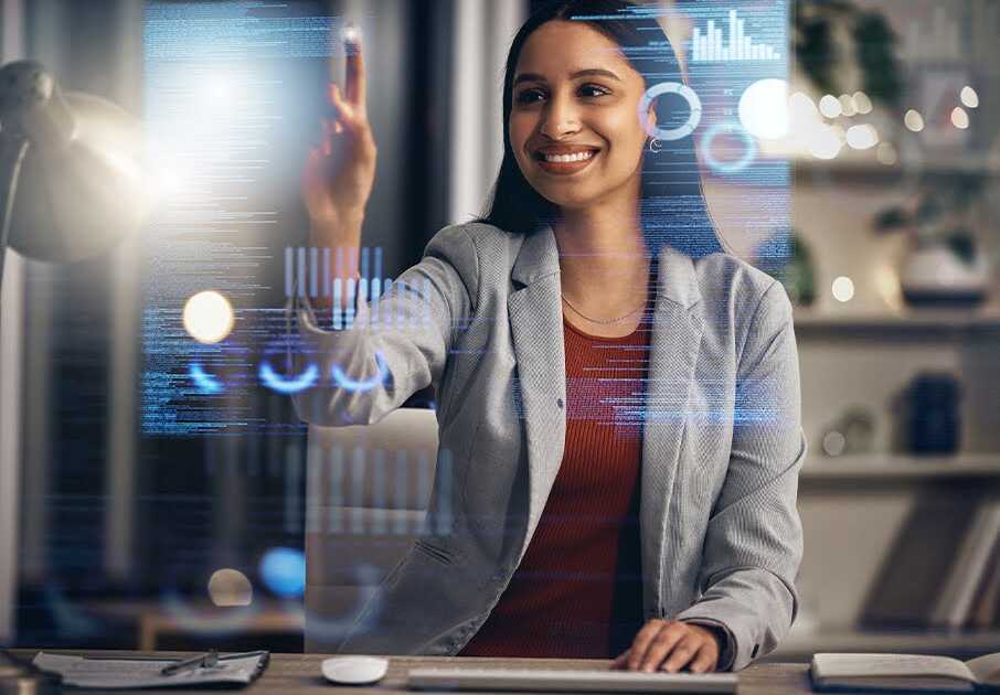 Smiling Woman Engages with Talent Acquisition Data on Virtual Screen